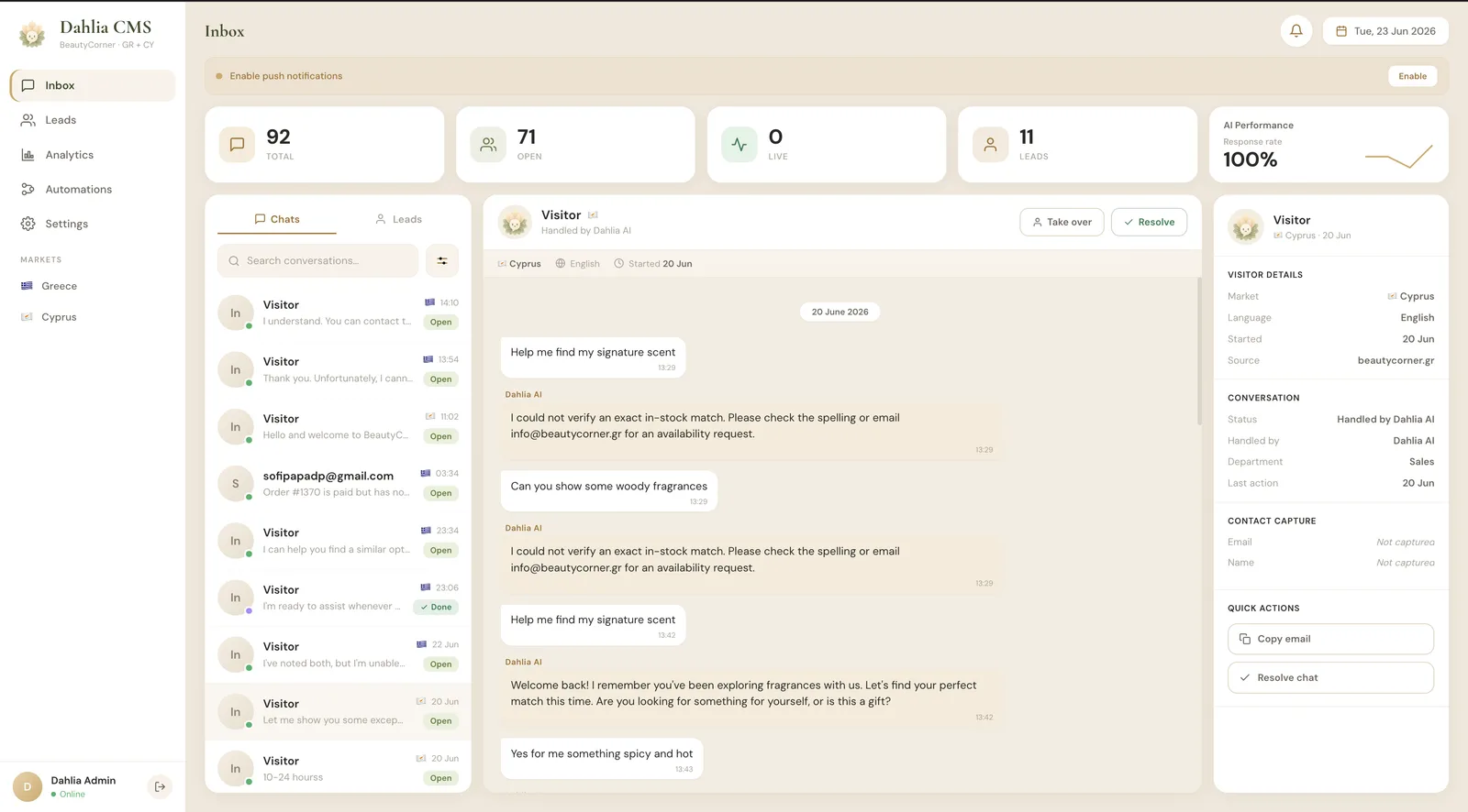 Dahlia CMS inbox with live chat, AI performance, conversation list, and visitor detail panel