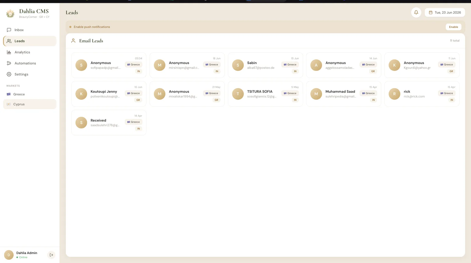 Dahlia CMS leads board showing captured email leads grouped by market and country